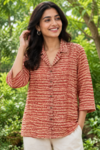 Young adult Indian woman wearing the Zig & Zag hand block printed shirt outdoors